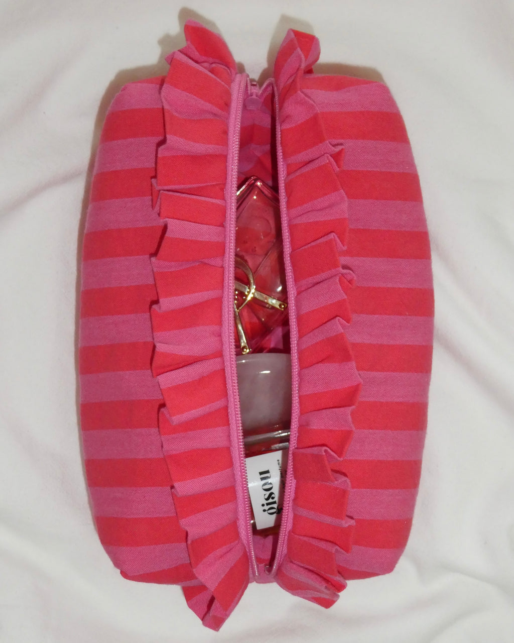 Pink stripes toilettas